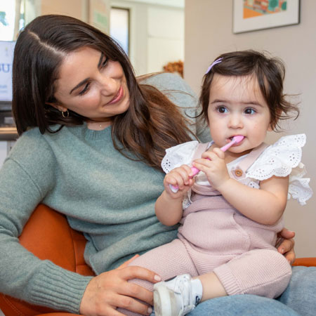 child on moms lap